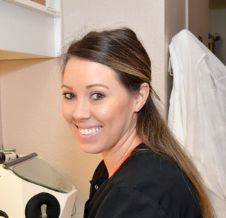 One of our assistants from Joe N.T. Nguyen DDS smiling in the dental office