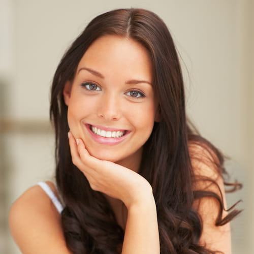 Woman smiling after cosmetic dentistry from Poway dentist Dr. Joe Nguyen