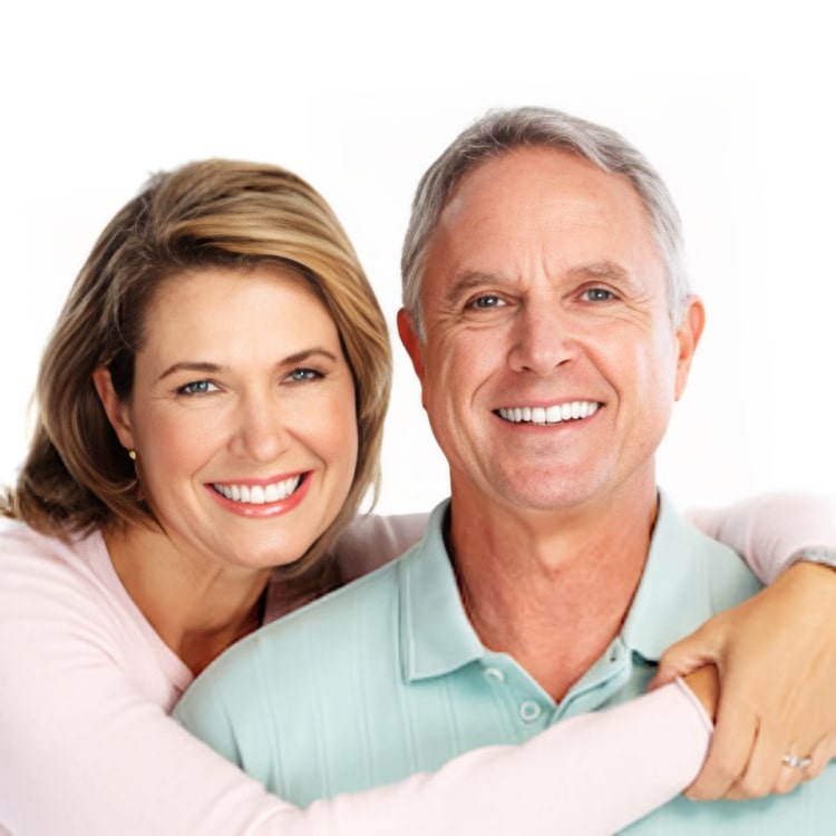 A mature couple smiling together