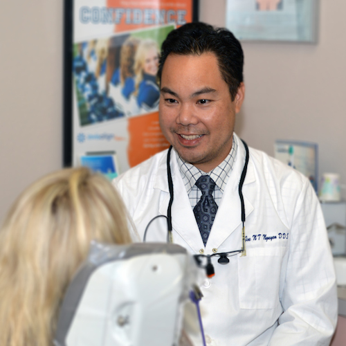 Dr. Joe N.T. Nguyen talking to an actual patient to show that the client is in control at this cosmetic dentist in Poway, CA