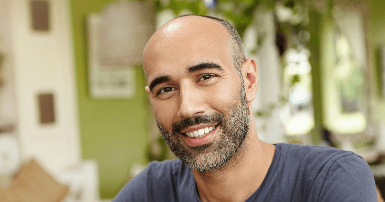 A man smiles after his dental treatment at Joe N.T. Nguyen DDS